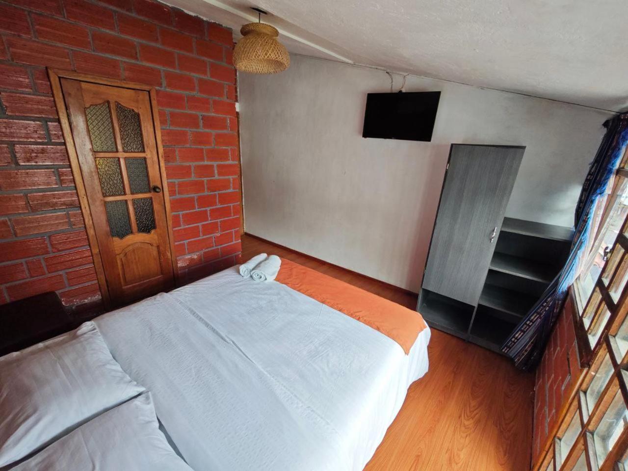 Garden House Hostal 巴尼奥斯 外观 照片